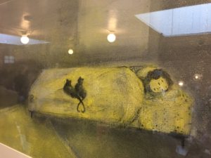 image of girl sleeping with cats